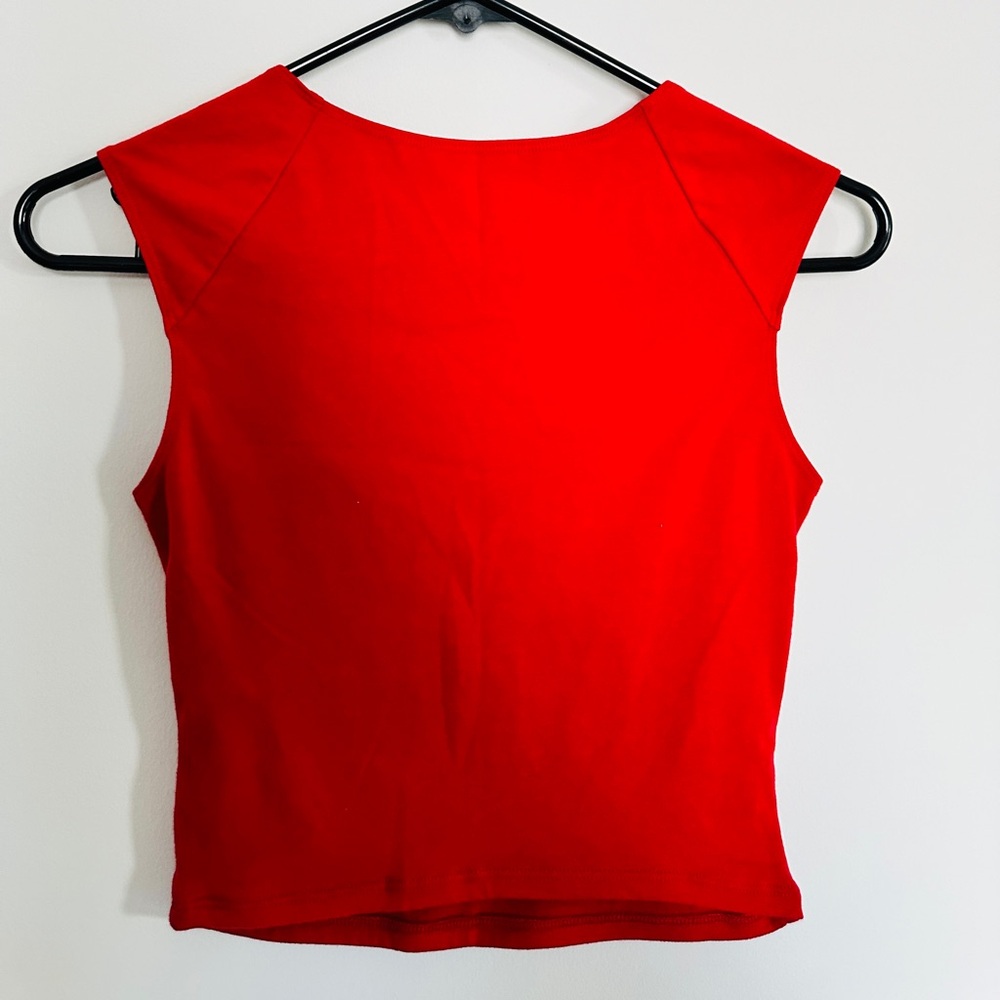 A red Hollister top